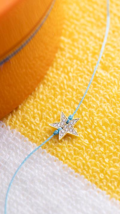 String bracelet with diamond-paved star in yellow gold - Redline - 0++