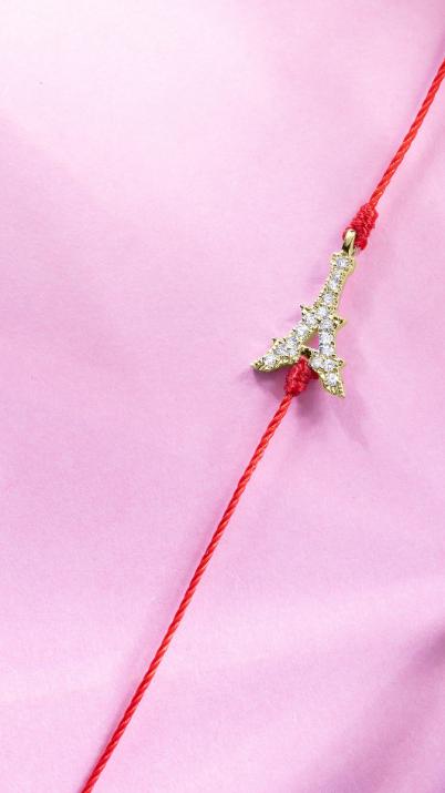 String bracelet with diamond-paved Eiffel Tower in yellow gold - Redline - 0++