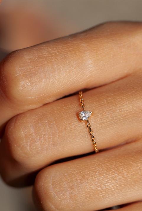 Anillo en cadena con diamante pera de 0.10ct en base de oro amarillo - Redline - 0++