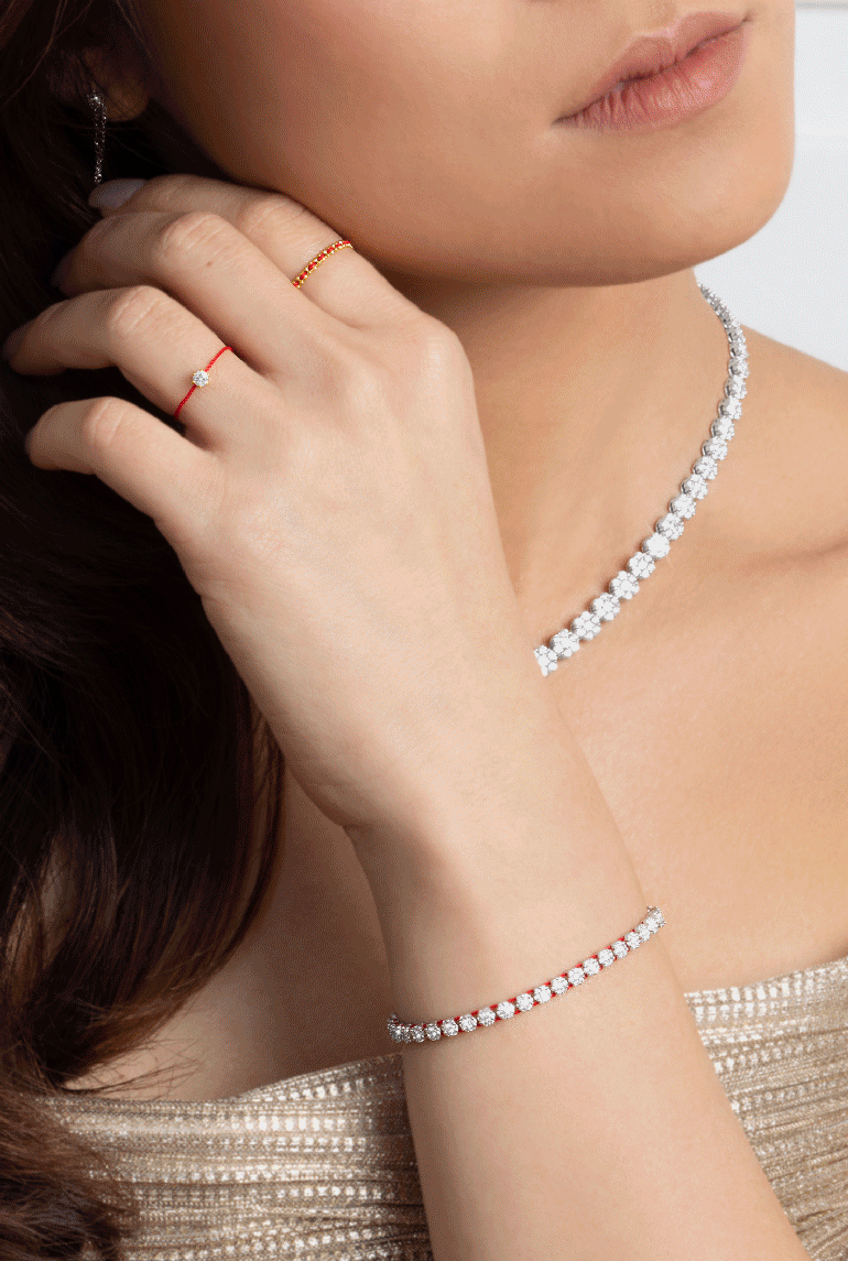 El hilo rojo de la suerte